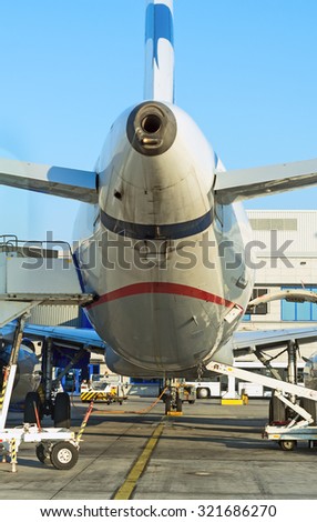 Passenger plane refueling in the airport. Aircraft maintenance.