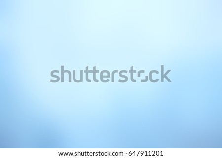 Abstract snow blank background. Pale blue winter blurred background. Frosty airy texture. Background light blue winter.