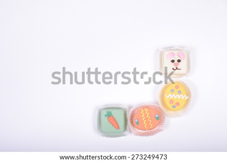 Easter frame - right bottom corner, made from small cakes with Easter symbols
