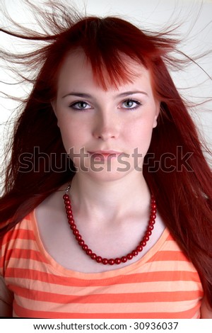 a red head ginger girl in an orange t-shirt