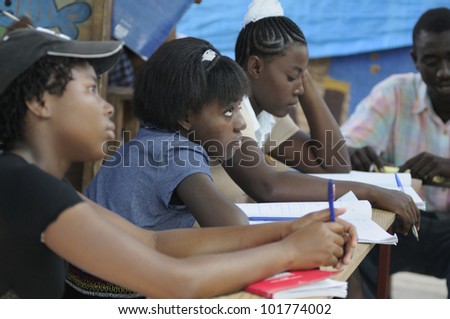CITE SOLEIL- AUGUST 25:  Female students attending classes in a local community school in Cite Soleil- one of the poorest area in the Western Hemisphere on August 25