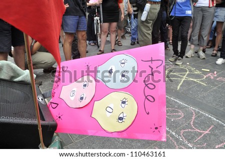 TORONTO -AUGUST  17:  A free pussy riot banner hanging out while speakers delivers speeches  during a protest rally organized to free \