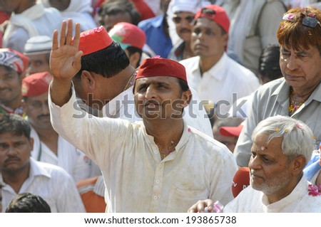 VARANASI-MAY 10: UP Chief Minister Akhilesh Yadav  acknowledging his voters during an election rally on May 10, 2014 in Varanasi , India.