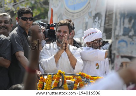 VARANASI - MAY 10: Rahul Gandhi acknowledging his supporters during a road show  to support local Congress candidate Mr. Ajay Rai on May 10, 2014 in Varanasi , India.