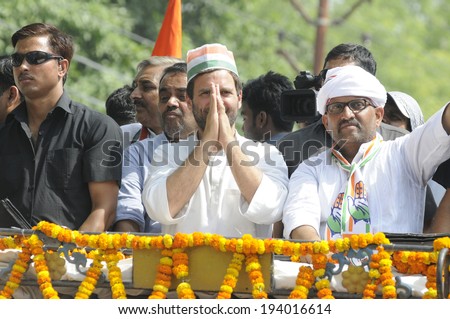 VARANASI - MAY 10: Rahul Gandhi  greeting the voters during a road show  to support local Congress candidate Mr. Ajay Rai on May 10, 2014 in Varanasi , India.