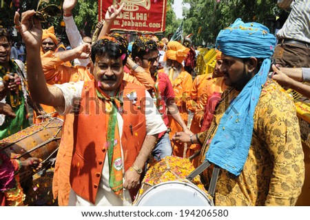 NEW DELHI-MAY 16:  BJP party workers dancing on music after BJP won the Indian National election on May 16, 2014 in New Delhi , India.