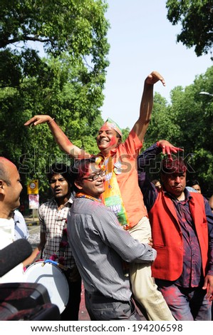 NEW DELHI-MAY 16: BJP supporters having fun  in front of party headquarter after BJP won the Indian National election on May 16, 2014 in New Delhi , India.