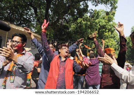 NEW DELHI-MAY 16: BJP supporters dancing ,singing and having fun in front of party headquarter after BJP won the Indian National election on May 16, 2014 in New Delhi , India.