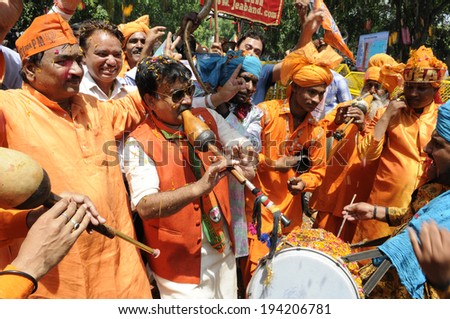NEW DELHI-MAY 16:  BJP party workers and musicians celebrating  after BJP won the Indian National election on May 16, 2014 in New Delhi , India.