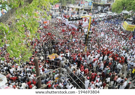 VARANASI-MAY 10: Followers of Samajwadi Party flocking the streets  during an election rally of UP Chief Minister Akhilesh Yadav on May 10, 2014 in Varanasi , India.