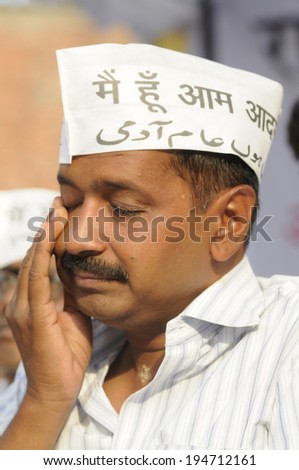 VARANASI - APRIL  27:  AAP leader  Arvind Kejriwal  rubbing his eyes during an election rally on April 27, 2014 in Varanasi , India.
