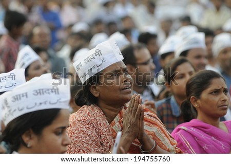 VARANASI - APRIL 27: An AAP supporter woman chanting prayers during a political rally  on April  27, 2014 in Varanasi , India.