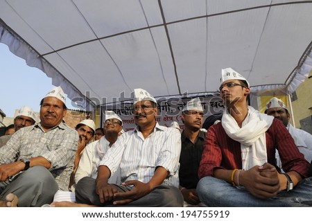 VARANASI - APRIL 27: Arvind kejriwal  along with his fellow leaders taking the centre stage during a political meeting  on April  27, 2014 in Varanasi , India.