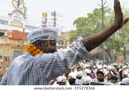 VARANASI - MAY  4 : Arvind kejriwal  waiving his hands towards his followers during a political meeting on May 4 , 2014 in Varanasi , India.