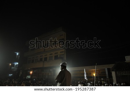 VARANASI - MAY  4 : Silhouette  impression of Arvind kejriwal while he was addressing  his supporters  during a political meeting  on May 4 , 2014 in Varanasi , India.