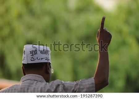 VARANASI - APRIL  29 : Arvind kejriwal addressing a crowd and pointing his finger towards \