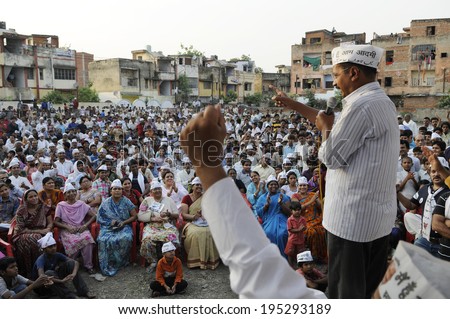 VARANASI - APRIL  27 : Arvind kejriwal being chanted while addressing a crowd during a political meeting on April  27 , 2014 in Varanasi , India.