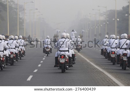 KOLKATA - JANUARY 19 : Kolkata Police traffic  sergeants riding their motorbikes during the Republic Day Parade preparation on January 19, 2015 in Kolkata, India.