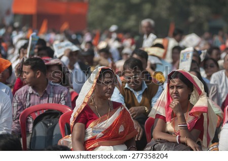 KOLKATA - DECEMBER 20: Women supporters listening to speakers during the Golden Jubilee celebration of VHP - a Hindu nationalist organization on December 20, 2014 in Kolkata,India.