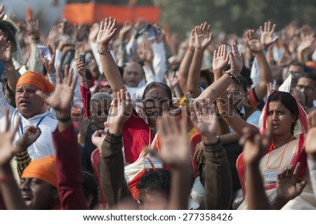 KOLKATA - DECEMBER 20: People of all ages singing sacred chants during the Golden Jubilee celebration ofVHP- a Hindu nationalist organization on December 20, 2014 in Kolkata,India.