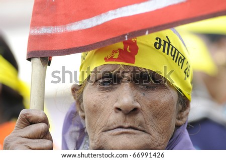 BHOPAL- DECEMBER 3 : An old woman who lost her family and her own eyes on the day of the  disaster,during a rally to mark the 26th year of the Bhopal Gas Tragedy, in Bhopal- India on December 3, 2010.