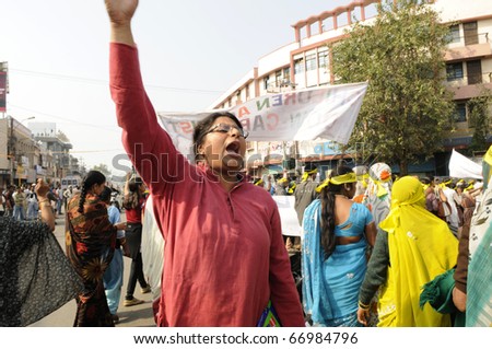 BHOPAL- DECEMBER 3: An Indian woman shouts slogans during the rally to mark the 26th year of the Bhopal Gas Disaster in Bhopal - India on December 3, 2010.