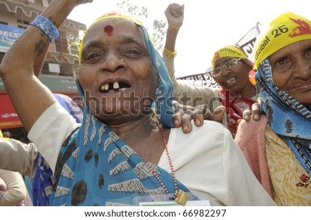 BHOPAL- DECEMBER 3: Old women victims share a laugh during the rally to mark the 26th Year of the Bhopal Gas Tragedy in Bhopal - India on December 3, 2010.