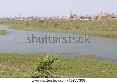 BHOPAL-DECEMBER 4:A view of the dumping ground of the Union Carbide gas plan twhere they dumped their chemical waste after the gas disaster in 1984 and localities,in Bhopal -India on December 4,2010.