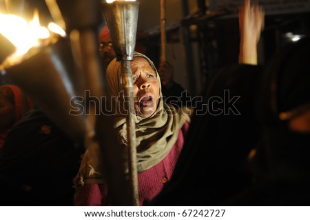 BHOPAL- DECEMBER 2: An angry protester during the torch rally organized to mark the 26th year of Bhopal gas disaster,in Bhopal - India on December 2, 2010.