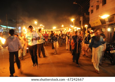 BHOPAL- DECEMBER 2: The rally on it\'s way  during the torch rally organized to mark the 26th year of Bhopal gas disaster, in Bhopal - India on December 2, 2010.