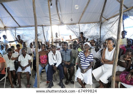 PORT-AU-PRINCE - AUGUST 31:Residents gathered in a meeting to decide on the future action regarding the alleged atrocities of the NGO\'s in Port-Au-Prince, Haiti on August 31, 2010.