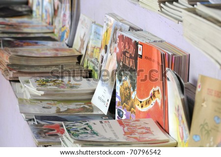 KOLKATA- FEBRUARY 4: Stack of English books from not too well known writers from India during the 2011 Kolkata Book Fair in Kolkata, India on February 4, 2011.