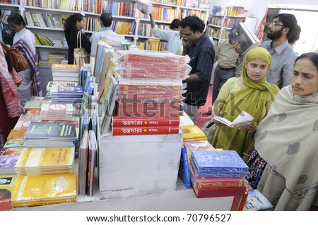 KOLKATA- FEBRUARY 4: People busy select their books inside a book stall during the 2011 Kolkata Book Fair in Kolkata, India on February 4, 2011.