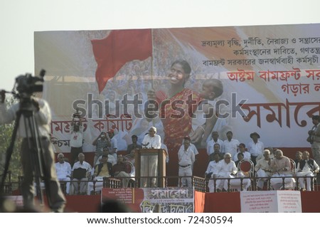 KOLKATA - FEBRUARY 13:   Chief Minister of West Bengal Mr.Buddhadeb Bhattacharjee speaks to the mass along with his ministers during a political rally  in Kolkata, India on February 13, 2011.