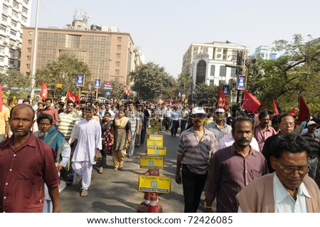 KOLKATA- FEBRUARY 13:  Peaceful supporters participate in  a political rally  in Kolkata, India on February 13, 2011.