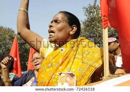 KOLKATA- FEBRUARY 13:   An angry woman supporter during a political rally  in Kolkata, India on February 13, 2011.