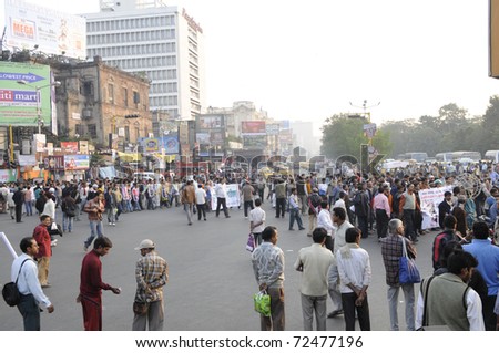KOLKATA- DECEMBER 20:  A political rally crosses the heart of Kolkata -the Chowringhee thus blocking the central transport system during a political rally in Kolkata, India on December 20, 2010.