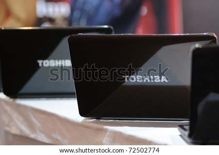 KOLKATA- FEBRUARY 20: Toshiba Laptops on display  during the Information and Communication Technology (ICT) conference and exhibition in Kolkata, India on February 20, 2011 in Kolkata, India.