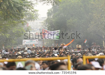 KOLKATA - FEBRUARY 20:Followers of All India Trinamool Congress appreciating speakers by waiving flags during a rally organized to kick the 2011 election campagne,in Kolkata,India on February 20, 2011.