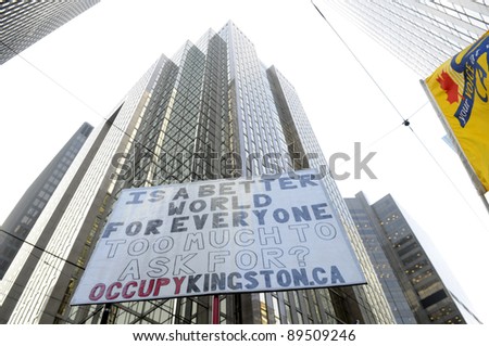 TORONTO - NOVEMBER 24:  Occupy movement messages taking control over the financial district of Downtown Toronto during a rally on November 24, 2011 in Toronto, Canada.