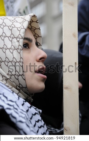 stock photo TORONTO JANUARY 10 An unidentified Arab teen listening to 