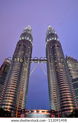 KUALA LUMPUR, MALAYSIA -AUGUST 30: Petronas Twin Towers on August 30, 2012 in Kuala Lumpur. Petronas Twin Towers are twin skyscrapers and were tallest buildings in the world from 1998 to 2004.