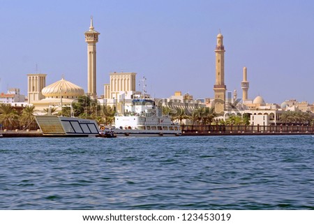 DUBAI, UNITED ARAB EMIRATES - OCTOBER 13: Dubai creek on October 13, 2012 in Dubai, United Arab Emirates. Dubai Creek is a saltwater creek and it divides the city into two main sections.