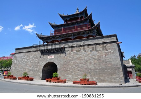 JIUQUAN, CHINA -Â?Â? JULY 28:  Bell and Drum Tower on July 28, 2013 in Jiuquan, China. Bell and Drum Tower was built in the fourth century. The existing tower is reconstructed in 1905 and twenty seven meters high.