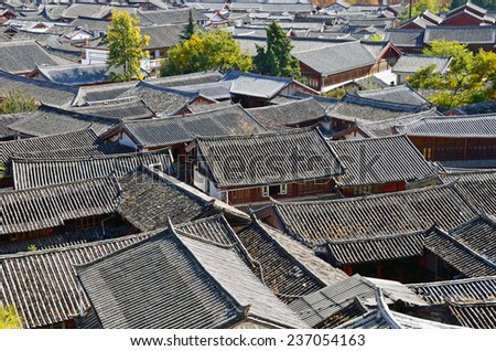 LIJIANG, CHINA - NOVEMBER 26, 2014: Old Town of Lijiang has a history going back to the thirteenth century and was a confluence for trade along the old tea horse road.It located 2400 meters high.