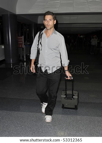 LOS ANGELES - FEBRUARY 6: Australian actor Eric Bana is seen making his way thru LAX (Los Angeles Airport) carrying his luggage. February 6, 2010 in los angeles, california
