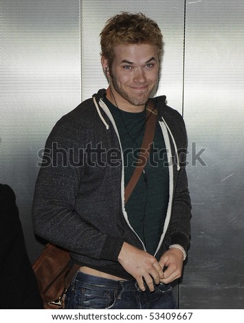 LOS ANGELES - FEBRUARY 5: Teen hearthrob Twilight actor Kellan Lutz is seen all smiles in a elevator at LAX. FEBRUARY 5, 2010 in Los Angeles, California