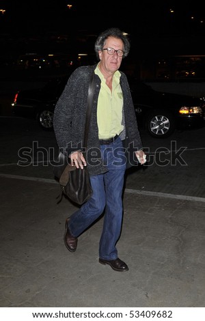 LOS ANGELES - APRIL 10. Australian actor one of the stars of Pirates of the Caribbean is seen with his bag and jacket at LAX. April 10, 2010 in Los Angeles, California