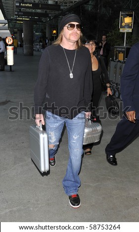 LOS ANGELES - MAY 30: Guns n Roses frontman Axl Rose is seen at LAX. May 30th in Los Angeles, California.