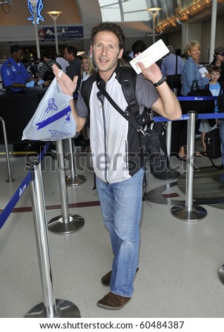 LOS ANGELES-JULY 6: Royal Pains actor Mark Feuerstein at LAX. June 4th in Los Angeles, California 2010